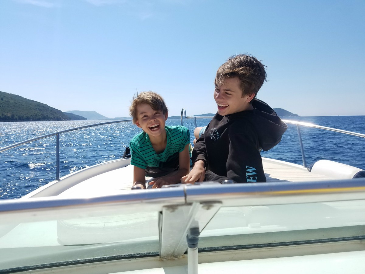 Enjoying a boat ride on the Adriatic Sea.